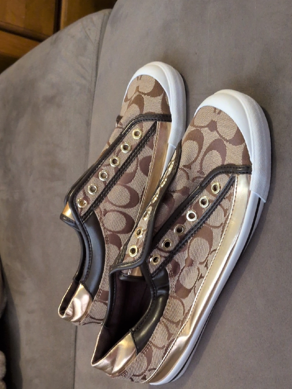 Coach Monogram Slip-On Sneakers in Brown and Gold